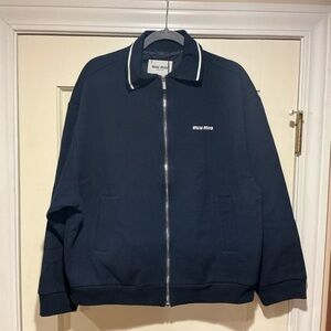 NWOT Miu Miu Logo Cotton Blouson Jacket in Navy, Size 36 = S (pit to pit 23 in)